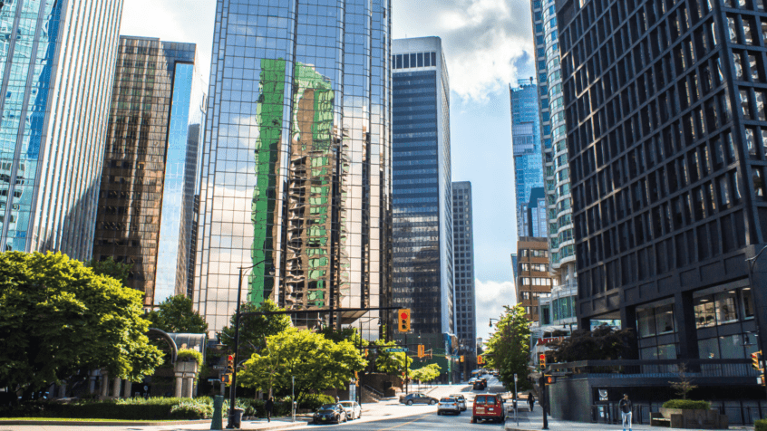 Image of Vancouver skyline, featuring glass commercial buildings.